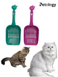 cat litter scoops, one green and one pink, with two cats on a white background. The brand 'Petology' is visible.